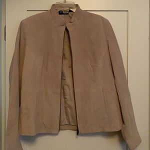 Light tan suede leather jacket. Is slightly lighter in color than photo shows.